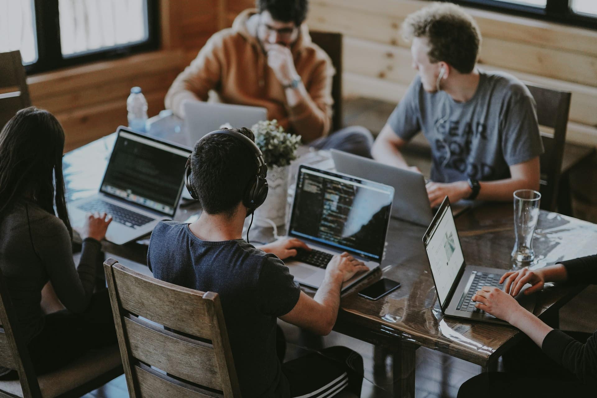 Team working together around a shared table